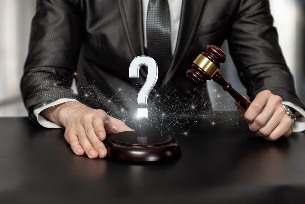 Criminal Defense Attorney with question mark sign