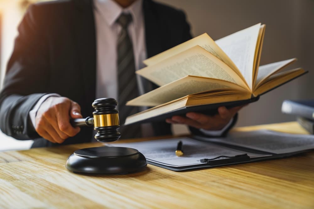 Expungement lawyer reading relevant laws of expungement